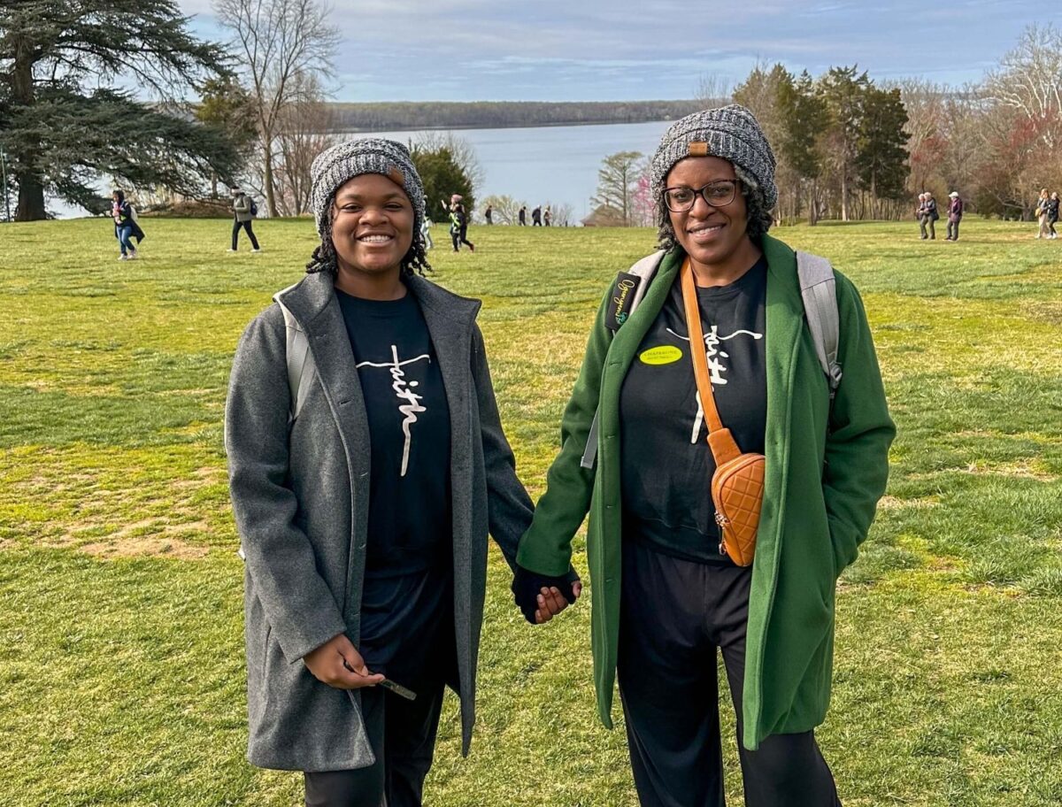 mother daughter holding Hans while visiting Mount Vernon.