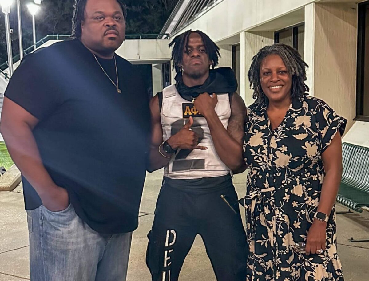 mother, father, and their Alpha Phi Alpha son